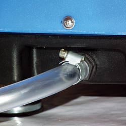 A self-draining crawl space dehumidifier connected to a sump pump system in Spencer