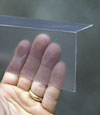 Closeup of a clear plastic covering on a Welchland crawl space block wall
