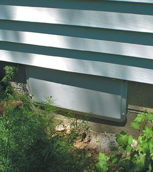 A gray crawl space vent cover in Manchester